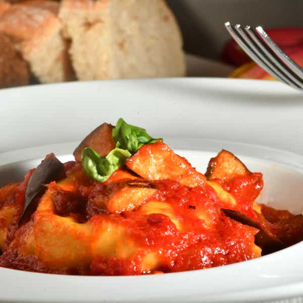 Ravioloni alla Norma con zucchine e scamorza Ravioloni alla Norma con zucchine e scamorza